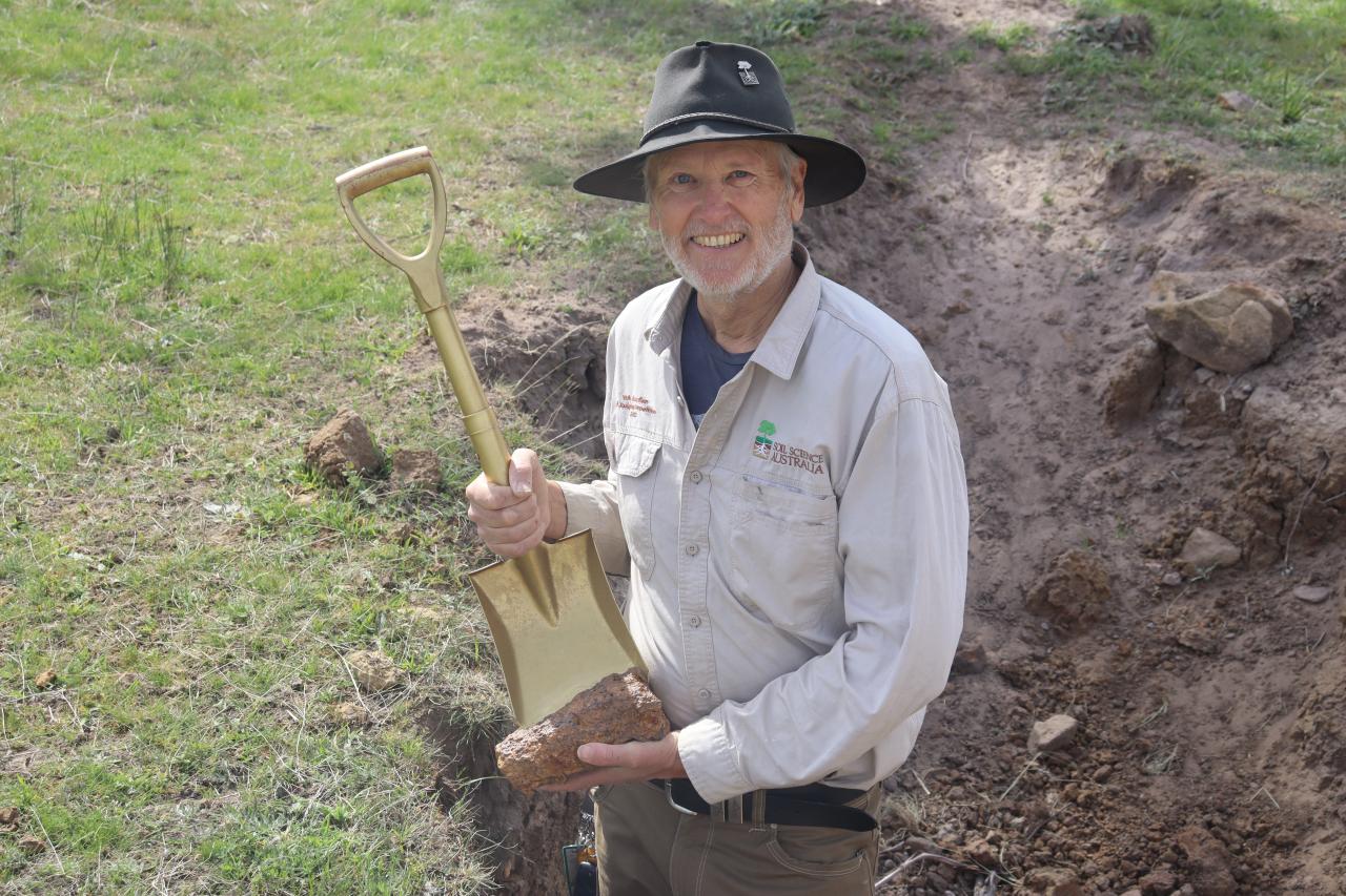 Richard Doyle with the Tasmanian Soil judging competition trophy.
