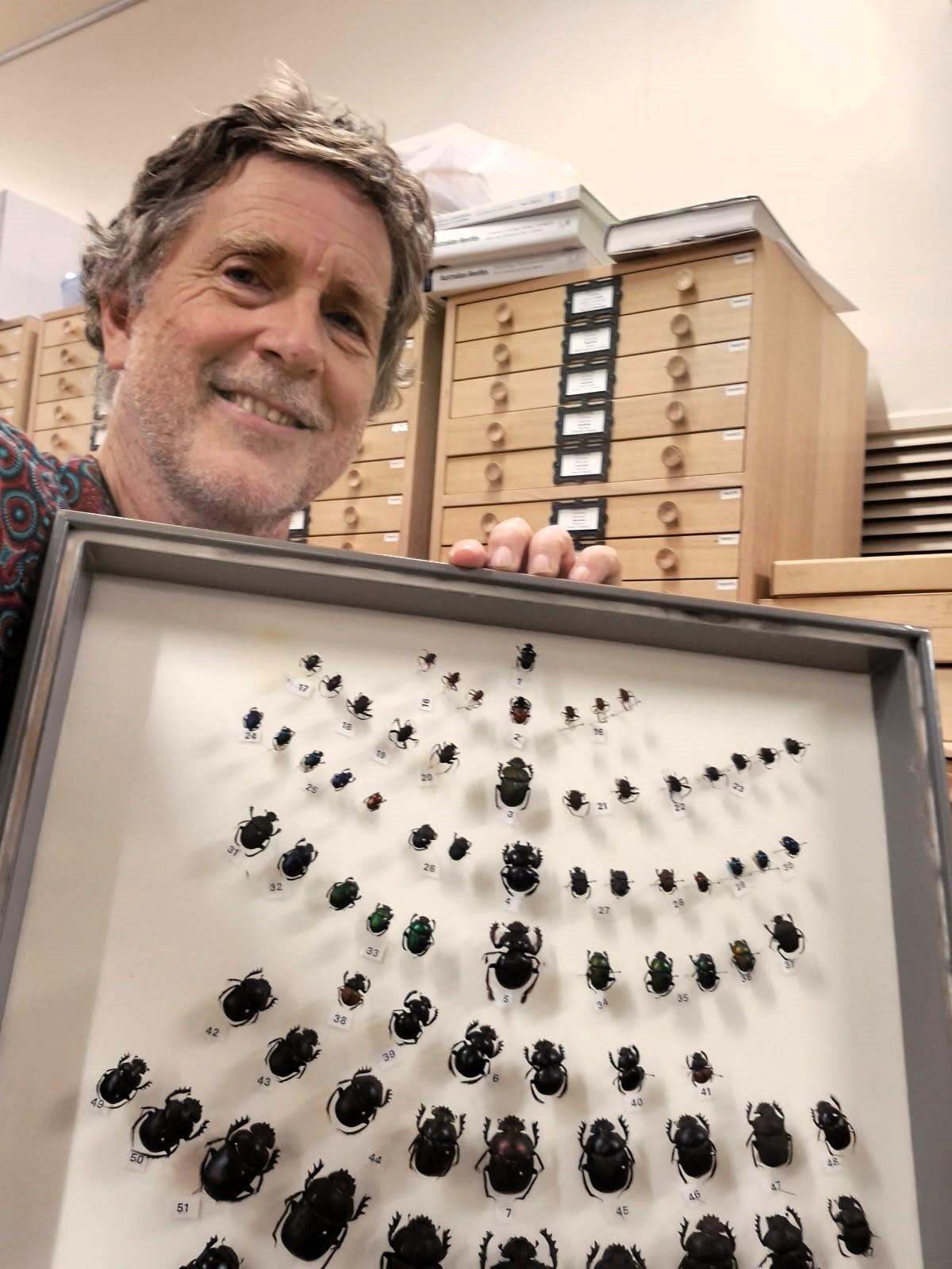 Dr Simon Grove with a dung beetle collection