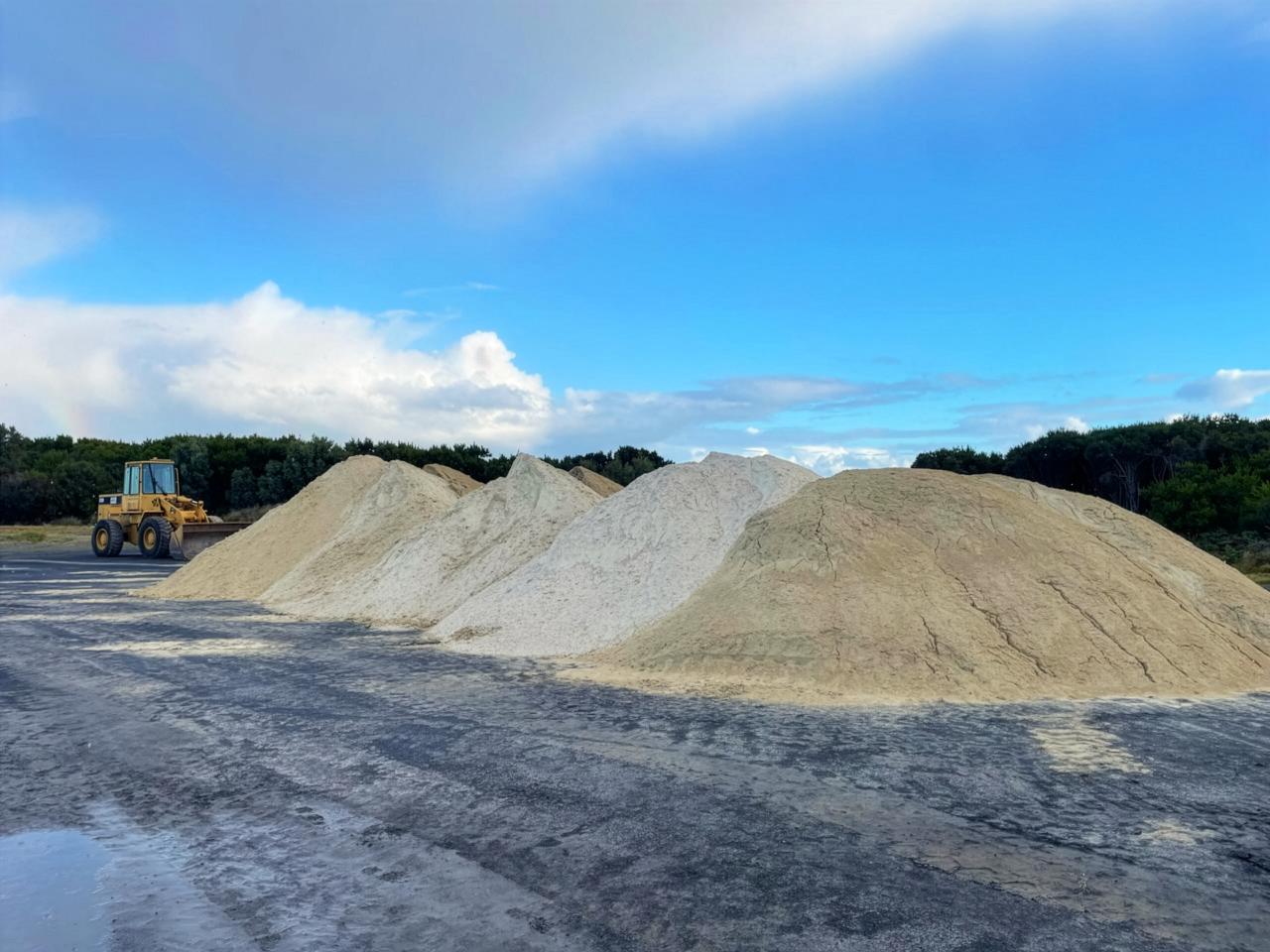Stockpiled Roger River Dolomite ready for use in a broadacre rehabilitation program on Robbins Island.