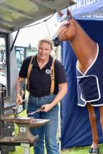  Kirstin Bradford of Scottsdale demonstrated the art of farrier work.