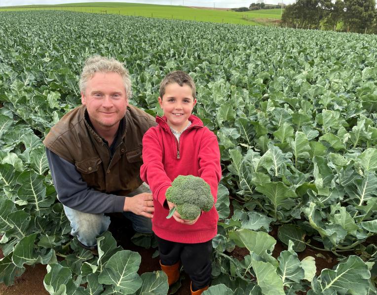  Randal Parker and his son Jacob in a crop of broccoli grown at Don for Harvest Moon
