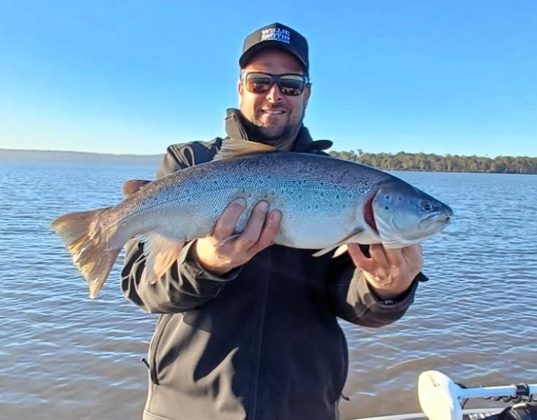 Clinton Cantwell with a solid female brown trout he caught from Lake Crescent last week