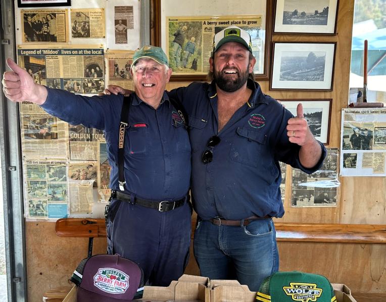 Tom Wolfe and his dad at the berry farm