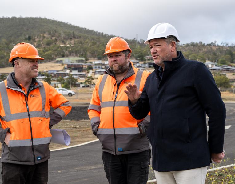 Michael Gravenall and Chris Stephens (Wilson Homes) with Roger Noble