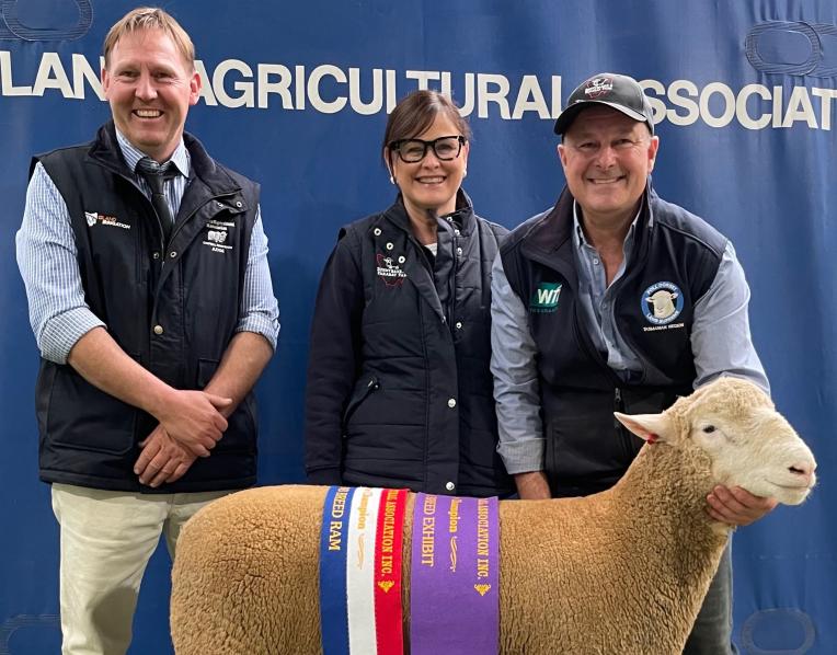Judge Marshall Douglas with Shannon and Paul Day and their Poll Dorset Supreme Exhibit