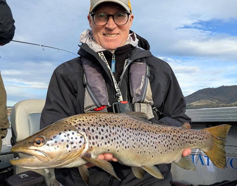 Plinio Taurian with a solid Derwent River sea trout he caught and released recently from the Derwent River at Bridgewater.
