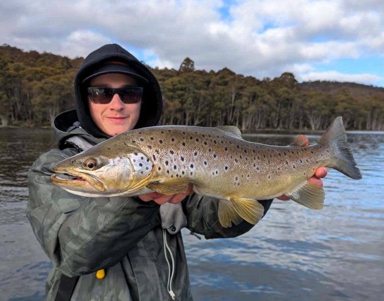 Arthur Whittock with a superb brown trout he caught from Bronte Lagoon over opening weekend