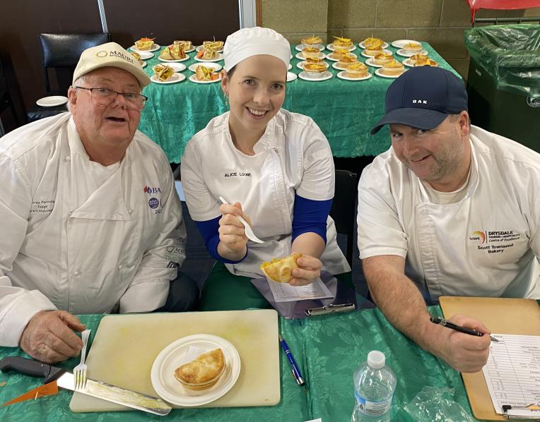 Judging of the scallop pie contest.