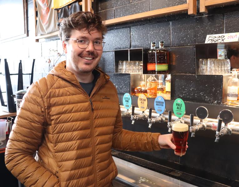 Nick Devereux with a beer.