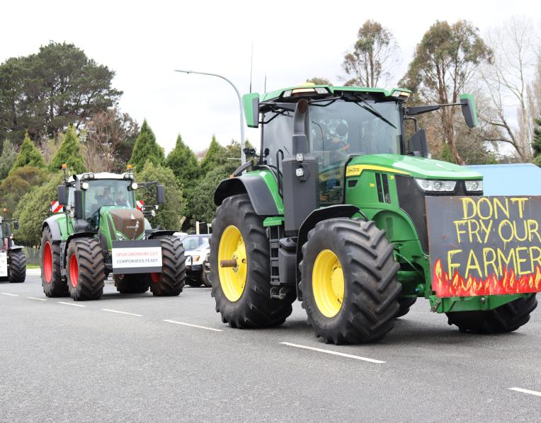 Potato farmers driving their tractors through Deloraine