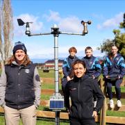 Kings Meadows High School students Baxter Manshanden, Bryce Austin, Gypsy Fitzallan and Olive Keating watch on as Kings Meadows High assistant principal Brendan Poke, Hagley Agriculture Learning Centre co-ordinator Liam Fox and Ag Logic field officer Chelsea McDonald demonstrate the weather station
