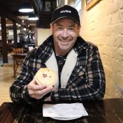  JJ’s owner Nathan Johnson with a maple bacon and brisket pie.