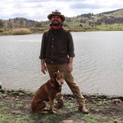 Logie Farm manager Lachlan Van Balen with Baxter