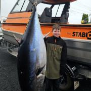 Harrison Nicole, 12, with the 130.5 kg Southern Bluefin Tuna he caught off Bass Strait.