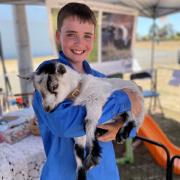 Baxter Rowbottom with Gracie the pygmy goat