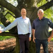 Potatoes Tasmania general manager Rob Salmon meeting with Branxholm potato grower John Casswell in Launceston on Tuesday. 