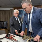 Crime Stoppers Tasmania chair David Daniels and Inspector Troy Morrisby.