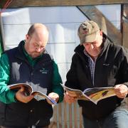 Nathan Calman and Gavin Pearce reading the Agri scorecard.