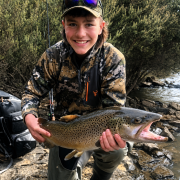 Nate Hepburn with a solid Brown Trout he caught from Lake Crescent last season.
