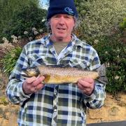 Stephen Lamprey with his $5000 winning tagged trout that he caught recently from South Riana Lake.