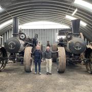 Westbury Preservation Association treasurer Robert Hill, left, and president Brenton Heazlewood with The Lion and The Lioness - a rare pair of Fowler winding engines which have returned to Tasmania this week after a 50-year absence.