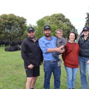 The Cluden Newry Angus Stud team - Tas Livestock Services marketing manager Owen Rowlings, owners Jock Hughes with son Ed, 5, and Claire Burbury and social media manager Ayla Rowlings.