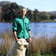 Matthew Tack with Maverick.