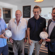 Premier Jeremy Rockliff, new Dairy owners Nick Dobromilsky and Graeme Wilson, and King Island Mayor Marcus Blackie.